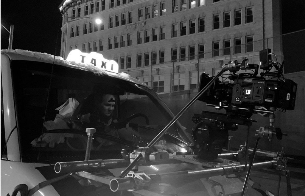 Taxi with camera rig attached.