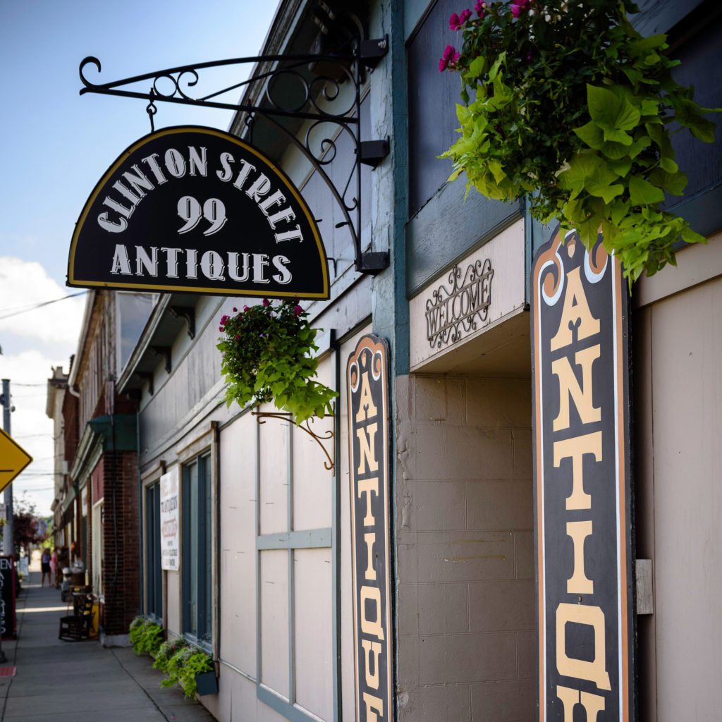 Sign and exterior of Clinton Street Antiques.